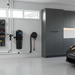 A black Element Central Vacuum DB7000 Power Unit, featuring a cylindrical shape with a bucket on top and a utilitarian design for home vacuuming needs. Capital Vacuum Raleigh Cary NC