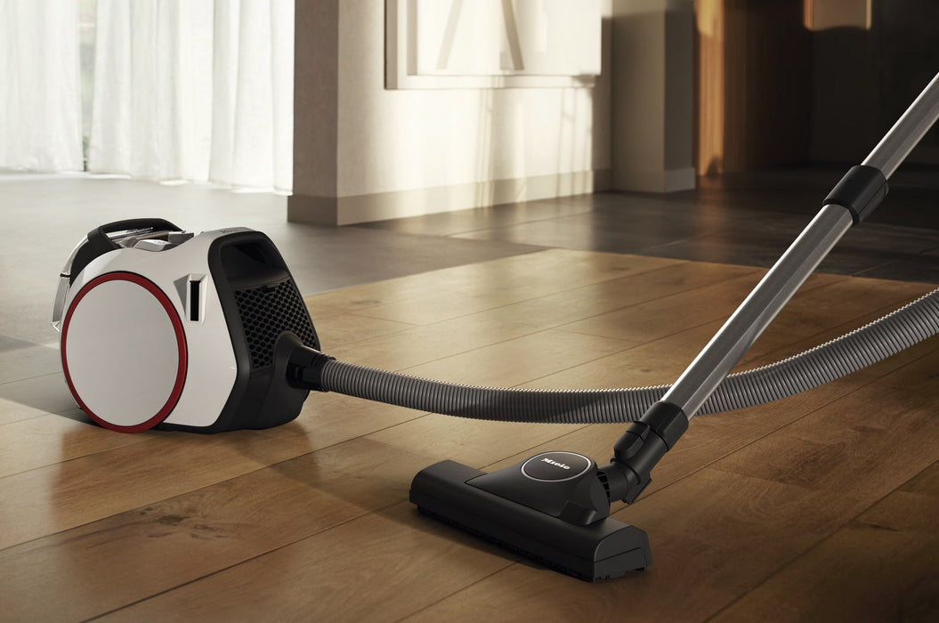 Miele Boost CX1 Lotus white SNRE0 in room. Capital Vacuum Raleigh Cary NC