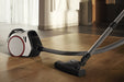 Miele Boost CX1 Lotus white SNRE0 in room. Capital Vacuum Raleigh Cary NC