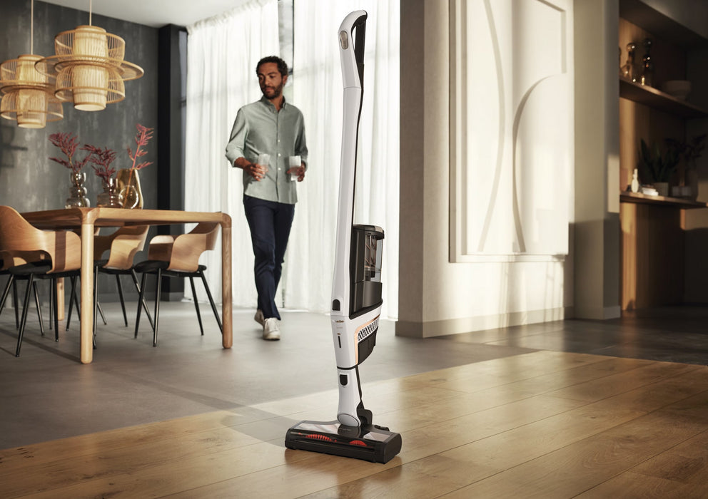 Miele Triflex HX2 Cordless White SMOLO in dining room. Capital Vacuum Raleigh Cary NC