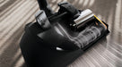 Close-up of a Miele vacuum cleaner SEB228 power nozzle head on a carpet. Miele Guard L1 Electro Titanium PF SUFE0 Canister Vacuum Cleaner Capital Vacuum Raleigh Cary NC