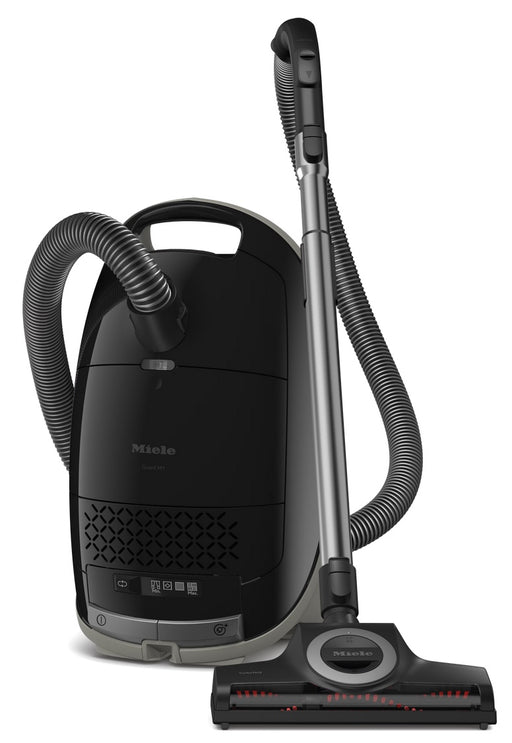 Black Miele vacuum cleaner on a white background. Miele Guard M1 Cat & Dog Canister Vacuum Cleaner SVZE0 Capital Vacuum Raleigh Cary NC
