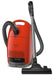 Red Miele vacuum cleaner with black attachments on a white background. Miele Guard M1 Terra Red SVWE0 Canister Vacuum Cleaner Capital Vacuum Raleigh Cary NC