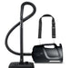 Black Riccar SupraQuick RSQ1 vacuum cleaner on a white background. Capital Vacuum Raleigh Cary NC