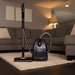 Riccar Prima canister vacuum cleaner with compact nozzle in living room. Capital Vacuum Raleigh Cary NC