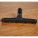 Sebo Black floor brush with bristles on a wooden floor. Sebo Airbelt K3 Premium Blue Canister Vacuum 91698AM Capital Vacuum Raleigh Cary NC