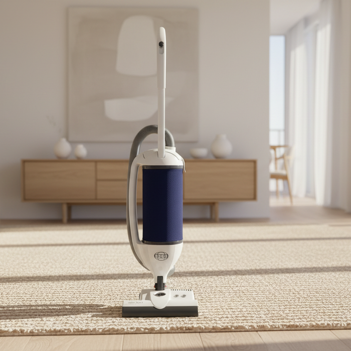 Vacuum cleaner on a carpeted floor in a modern living room. Sebo Dart Upright Vacuum 9855AM Capital Vacuum Raleigh Cary NC