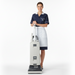 Woman in a cleaning uniform holding a vacuum cleaner. Sebo G4 Commercial Upright Vacuum 90406AM Capital Vacuum Raleigh Cary NC