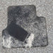 Uproot Clean Pro before and after on automobile carpet mat. Capital Vacuum Raleigh Cary NC